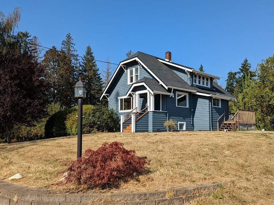 New roof, new paint, new front deck...this spectacular farmhouse on acreage is ready for new owners!>