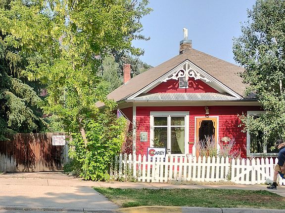 House in Historical District. On 3 full city lots fully fenced. Ski CO couple in far back corner carriage house.