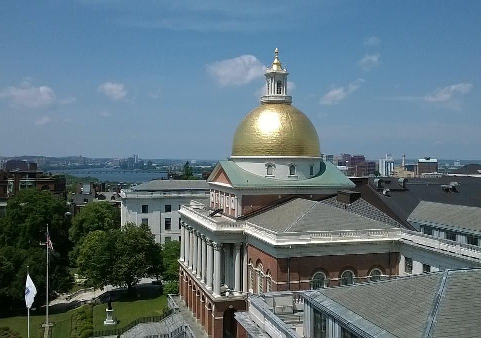Roof deck view of State House, Charles River