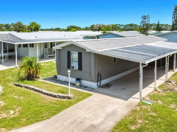 620 Papaya Cir, Barefoot Bay, FL 32976