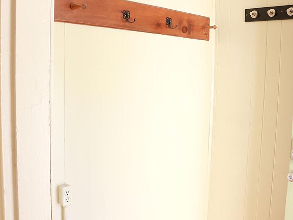 Mud room as you enter into apartment