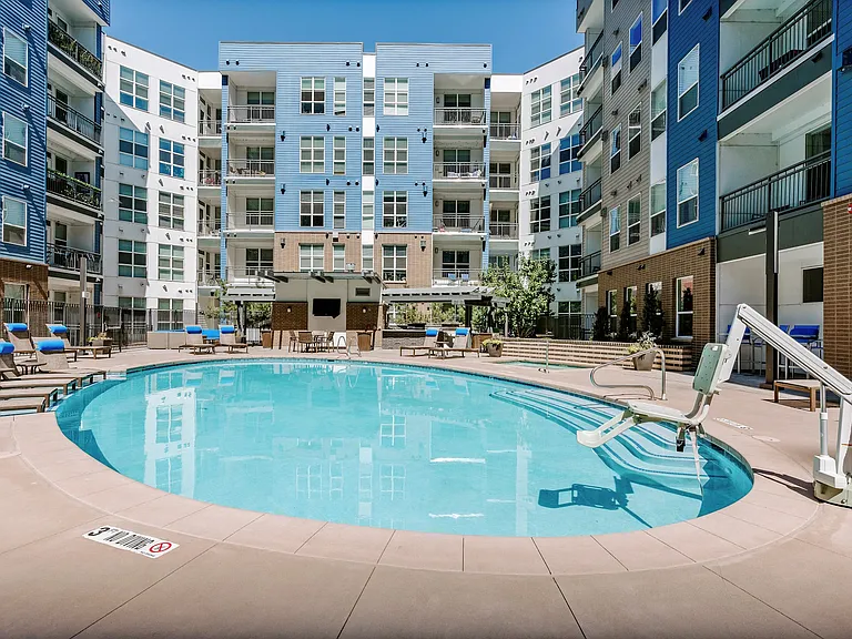 City House Apartments Pool Area and Building Exterior
