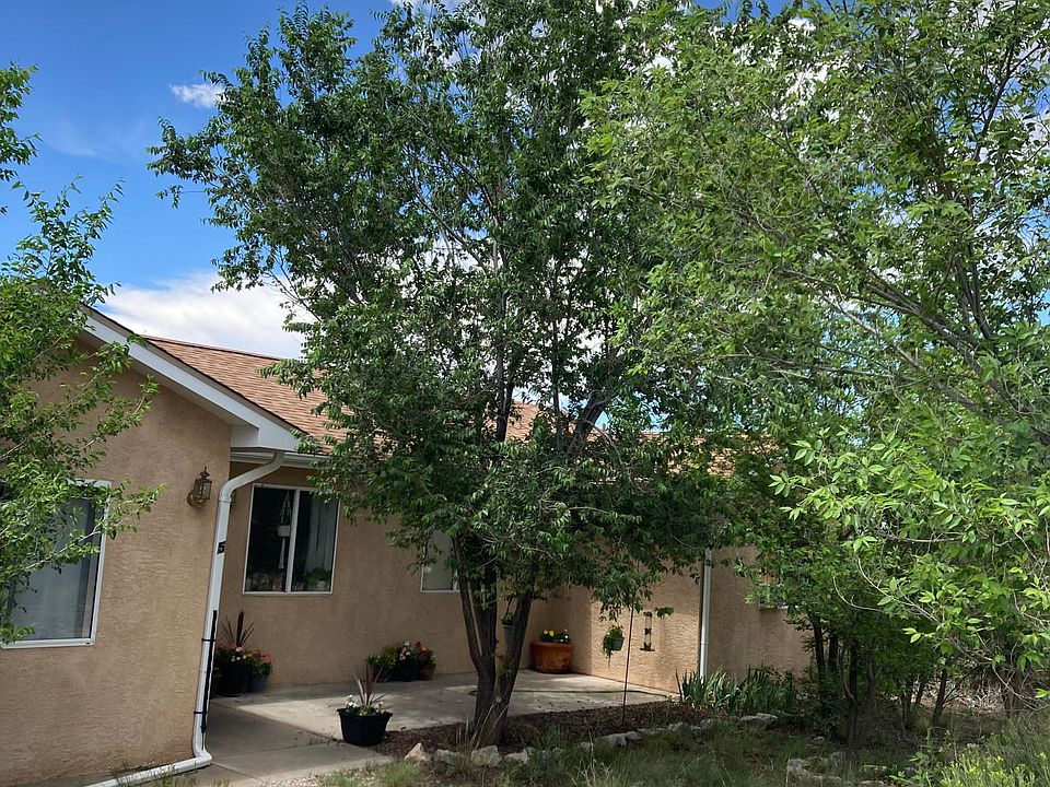 Front of home from circle driveway.