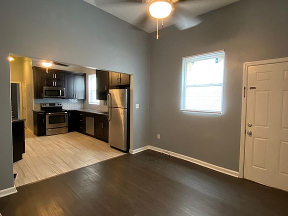 living room into kitchen
