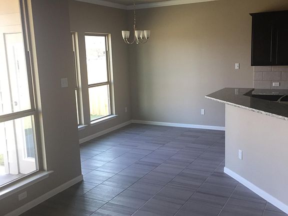 Dining area. Windows now have 2" blinds