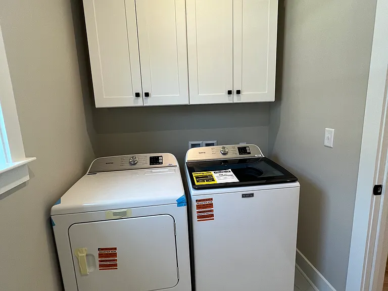 Laundry with new washer and dryer