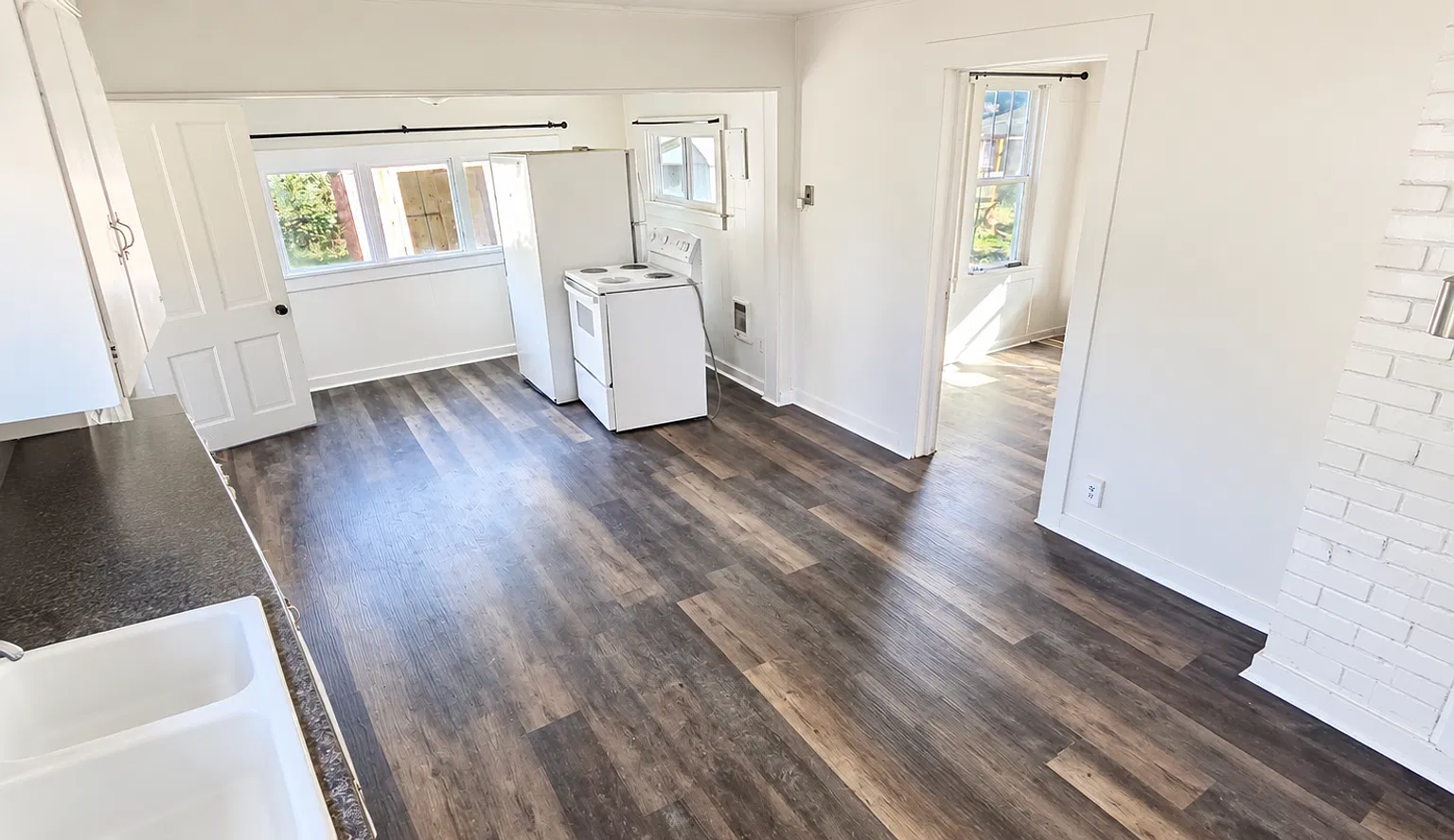 Charming 4-Bedroom Country Home with Spacious Yard & Updated Flooring! — Photo 4