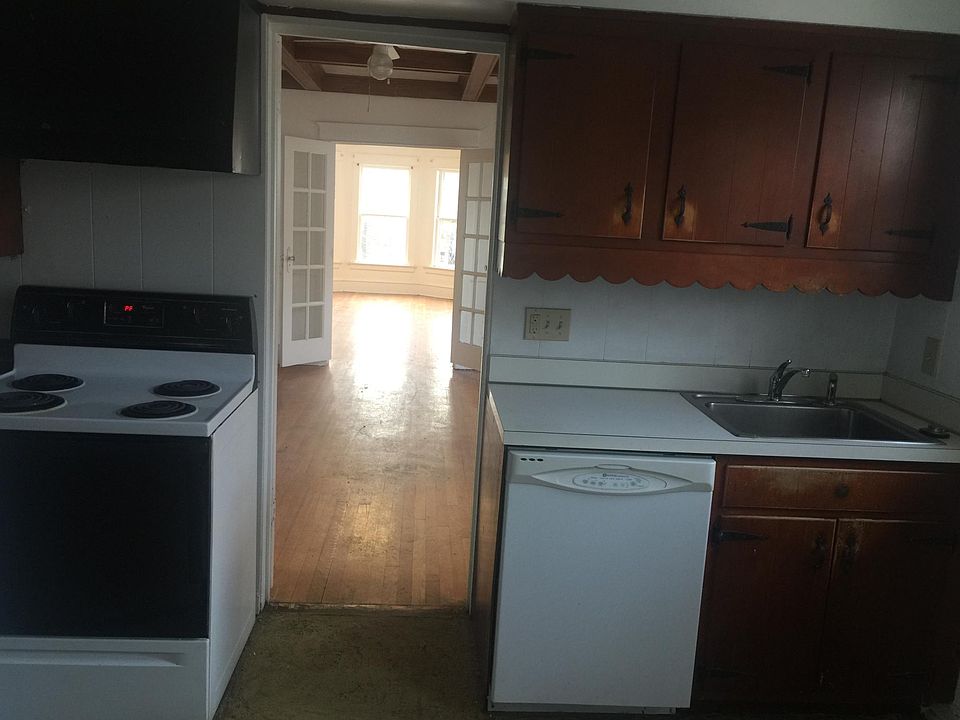 Kitchen with view through Dining Room and Living Room