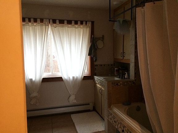 Bathroom with a soaking tub