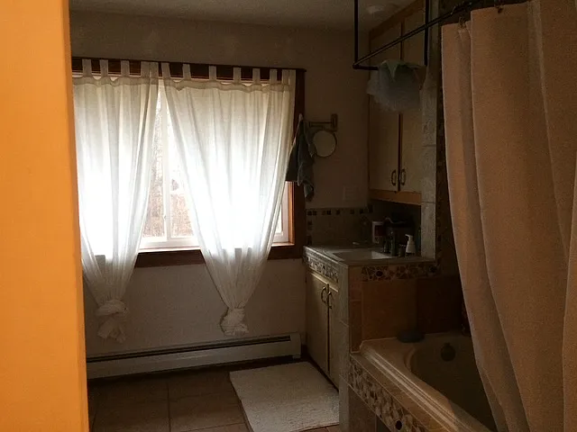 Bathroom with a soaking tub