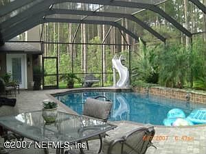 $70,000 Screened PebbleTec Pool with all the Bells 