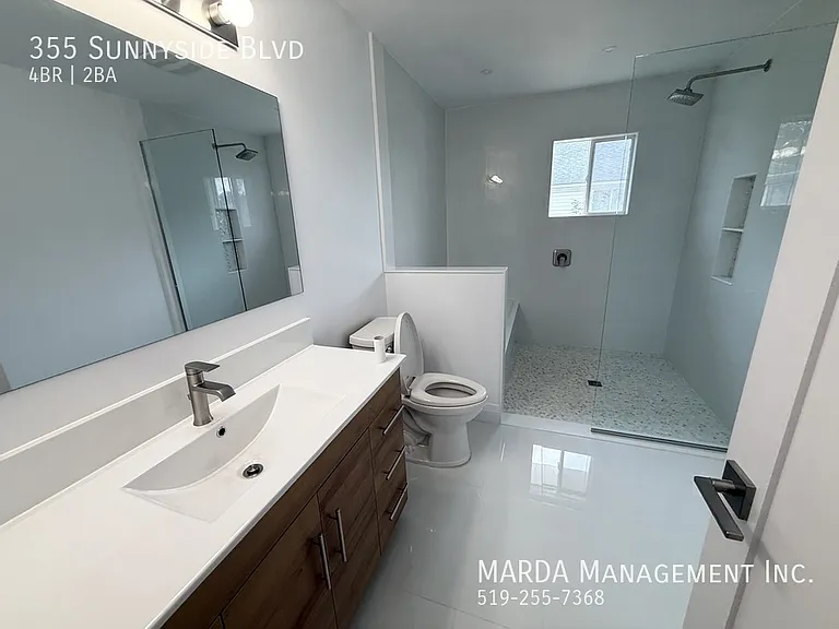 355 Sunnyside Blvd — Photo 63