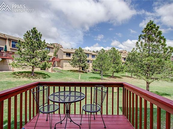Back deck looks onto green belt.
