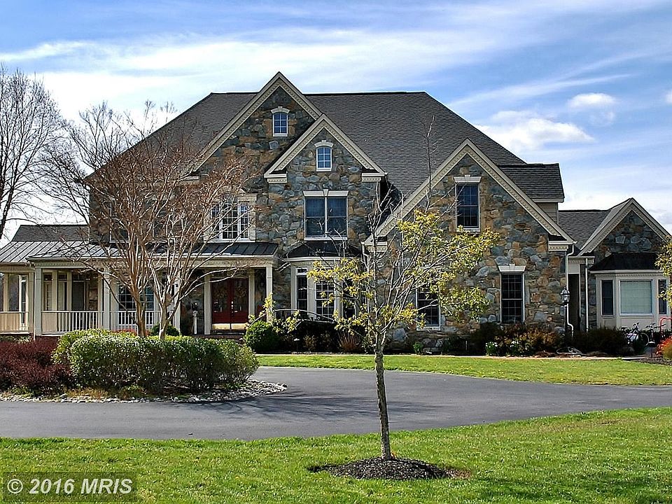Stone Front With Circular Driveway