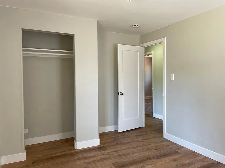 Bedroom overlooking the park with large reach-in closet