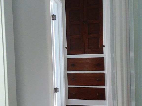 Upstairs hallway with built-in storage 248.5q5