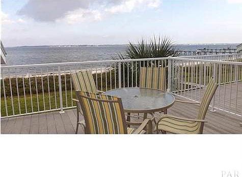 Huge patio off kitchen and main room on the diect sound and beach side