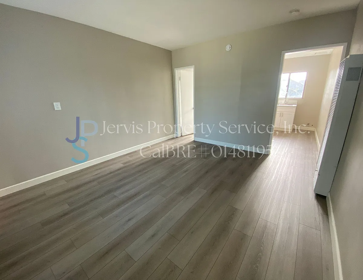 Building Photo - 7018 Marbrisa Ave #N