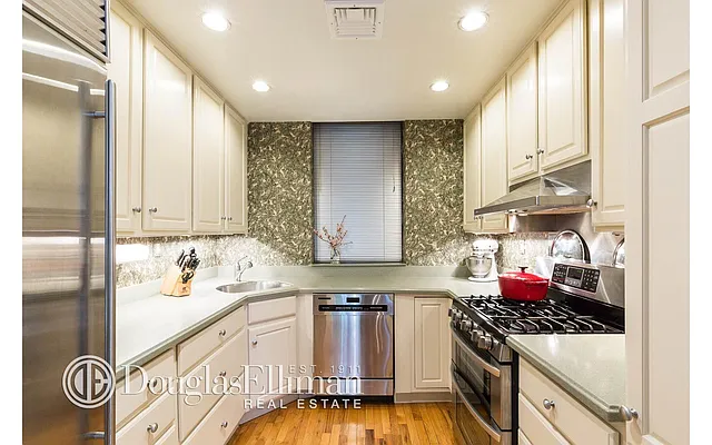 Sold by Douglas Elliman | media 13