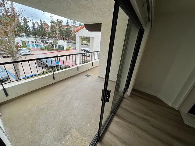 Large balcony, big enough for table and chairs.