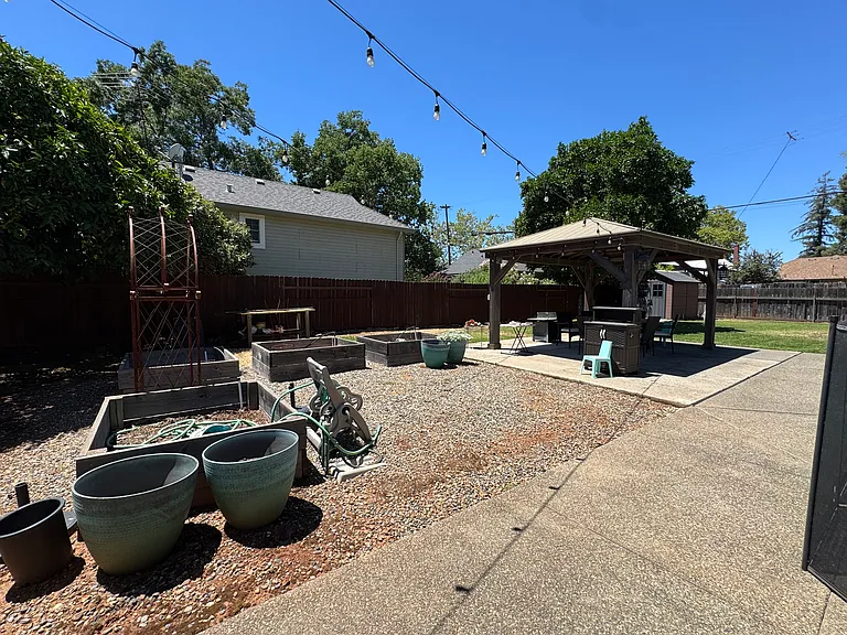 4 garden boxes with water, gazebo & bistro lights