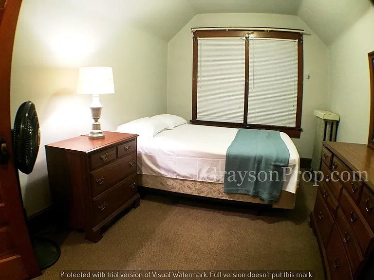 Queen bed sealed in a bedbug protective bag.