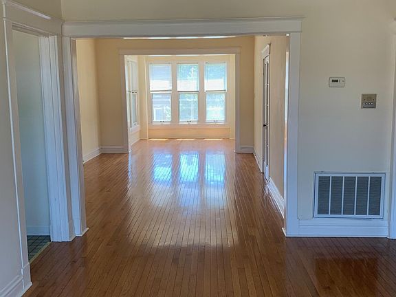 In the dining room, looking south through living area and porch.