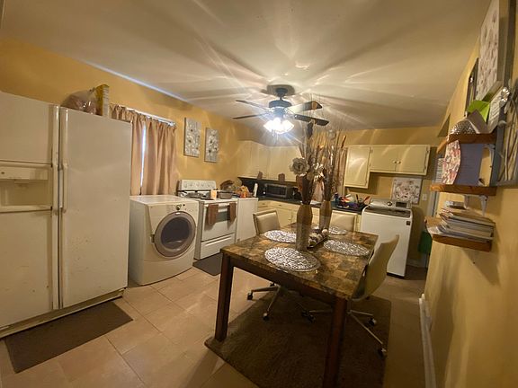 Spacious kitchen will be unfurnished but does come with refrigerator and stove