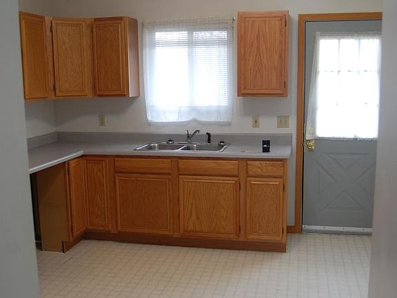 Kitchen with informal dining. Door to the deck.