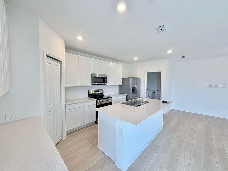 6472 Domizio Dr — Photo 10