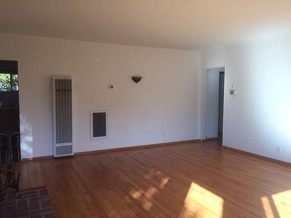 Living room, hall to bedrooms on right