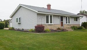 Front View & East Side