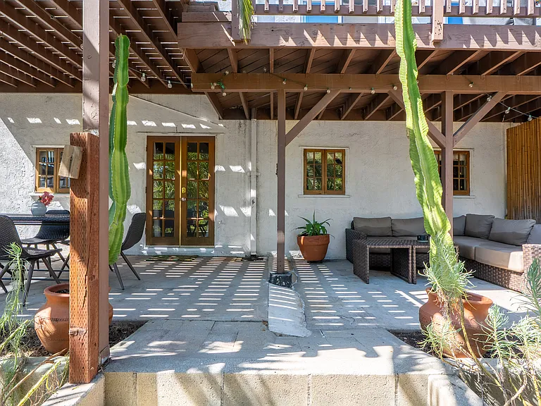 Charming outdoor living area (furniture included). Studio has exclusive use