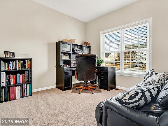 Main level bedroom serves as home office