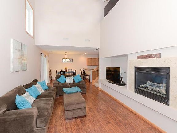 Step into the home to gleaming floors, vaulted ceiling and natural sunlight.
