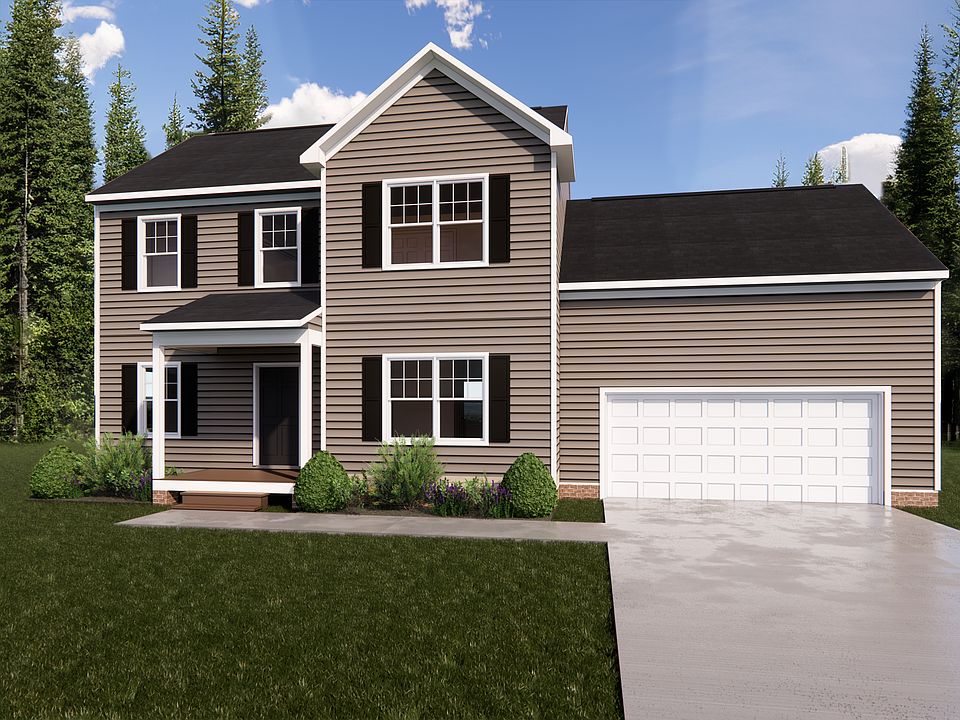 A charming two-story house in Poplar Village, featuring beige siding, black shutters, and a white ga