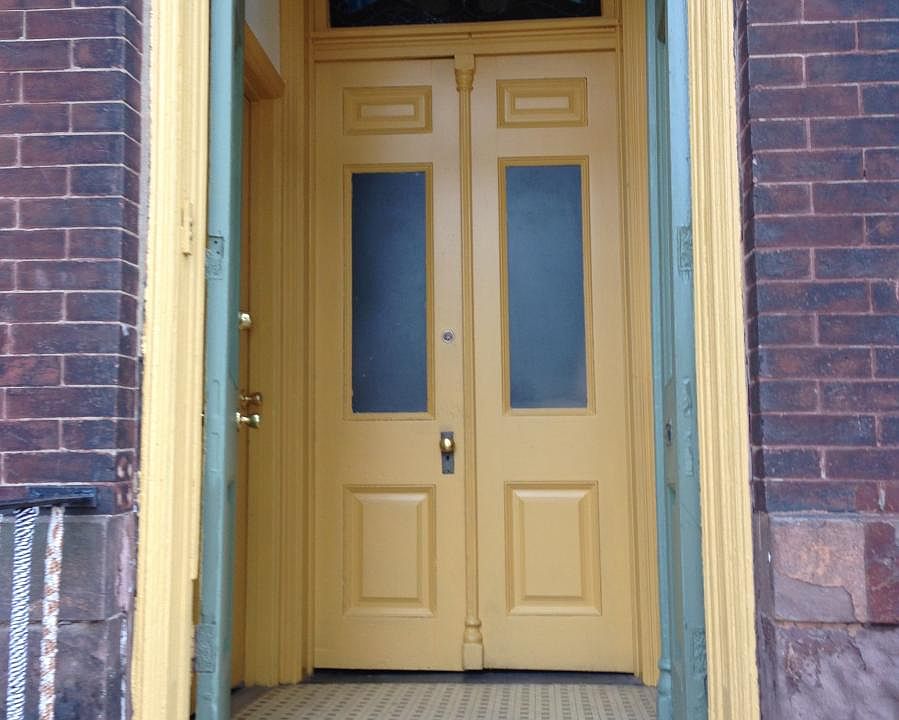 Original double doors with stained glass