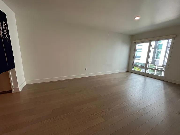 West-facing living room with view of interior garden