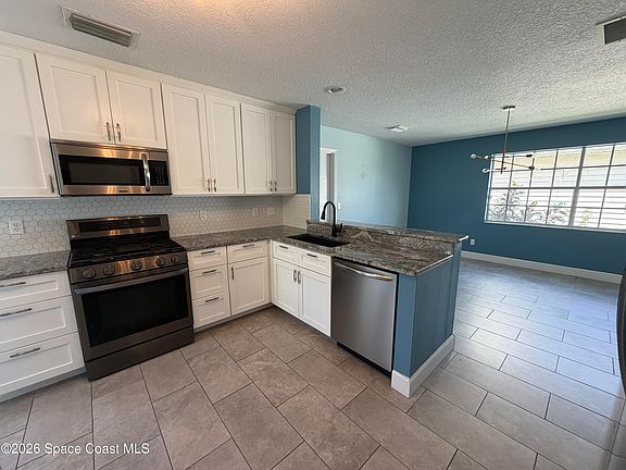 3rd image of 1599 Pga Blvd