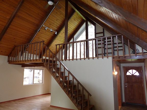 Living room looking into loft area
