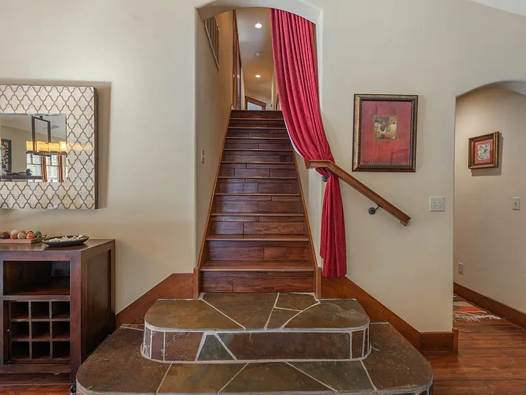 Stair to second floor bedrooms and bathrooms