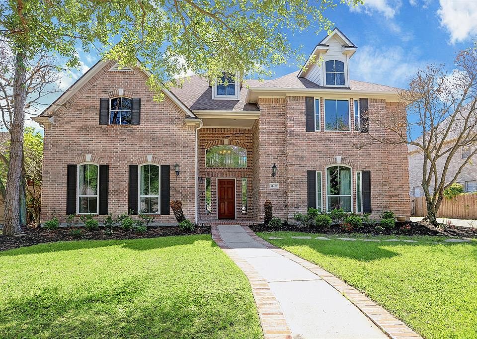 Beautiful Home in Champion Forest - Move In Ready. Everything's been updated - Roof done in March this year, replaced HVAC system, updated the windows, kitchen and master bath remodeled, wood-look tile floors throughout downstairs.