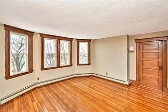 Living room, closet at right