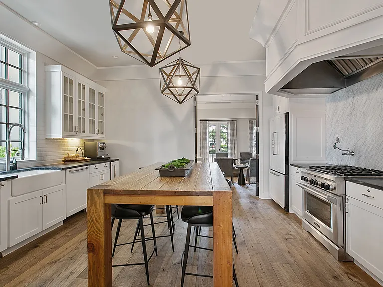 A chef-inspired kitchen designed for hosting and celebration, featuring premium appliances, generous prep space, and a polished setting for everything from private events to casual gatherings