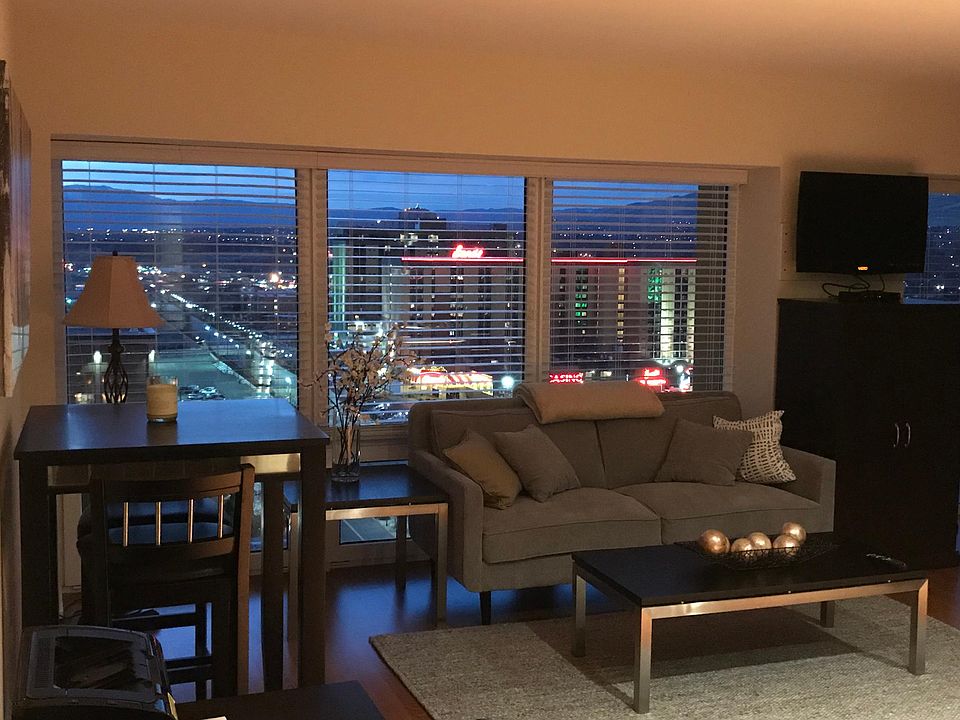Living Area, Early Evening Views of Downtown & Mountains