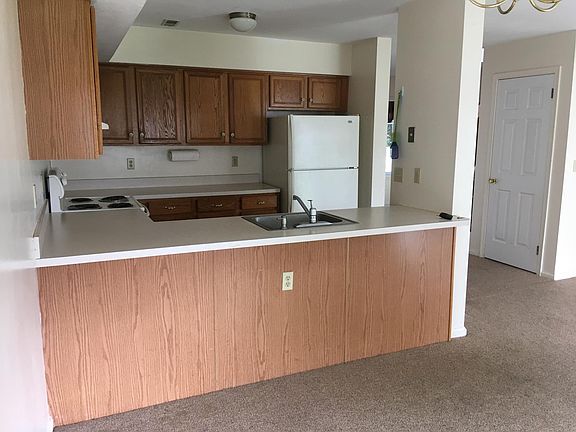 Standing in dining area looking at kitchen