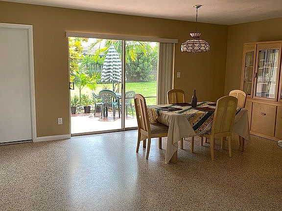 Dining rm w/ back yrd view