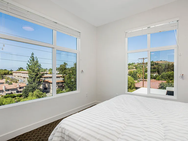 The Harrington bedroom with two windows