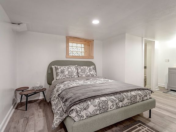 Bedroom with full bathroom