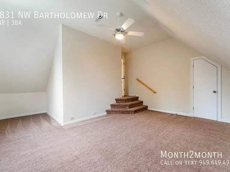 9831 NW Bartholomew Dr — Photo 28